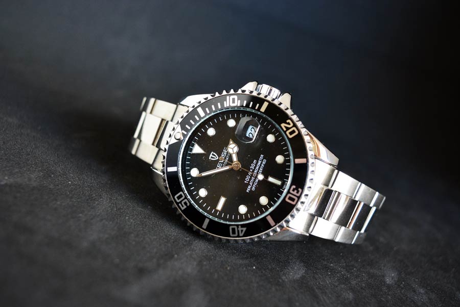 Imitazione Rolex con 20 dollari